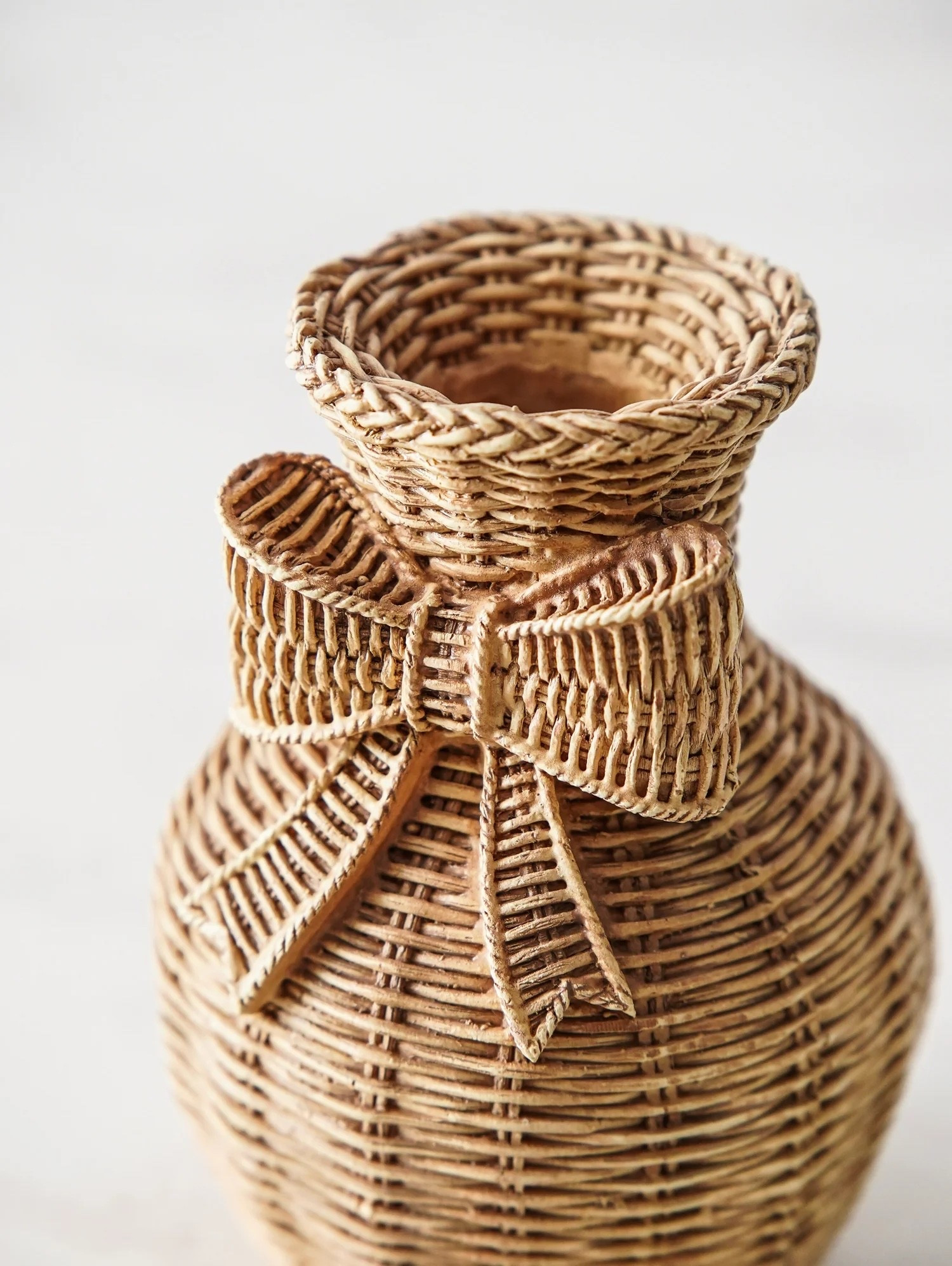 The Bow Weave Vase blends soft texture with charming detail, creating a decorative accent that feels both timeless and thoughtfully styled

#LTKHome