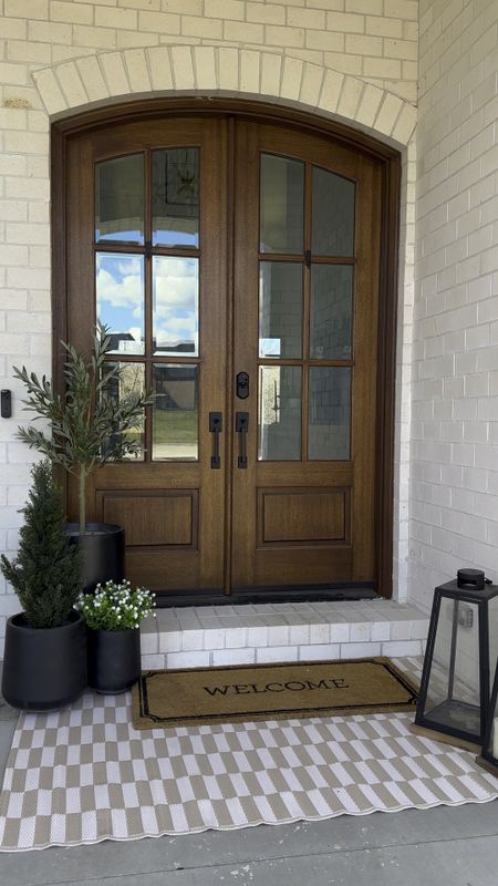 Don’t mind my sad melted faux candles… I had to share my front porch spring finds! This outdoor rug I used under my doormat is beautiful and only $20!! 
.
.


#LTKfindsunder50 #LTKhome #LTKSpringSale