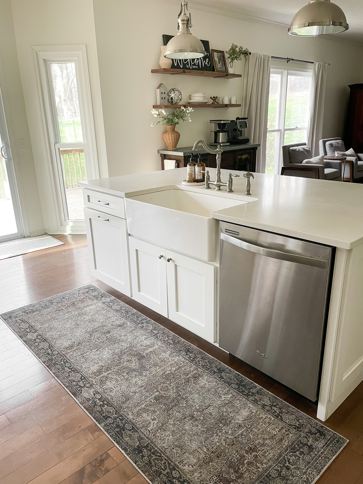 My kitchen island is my favorite part of our kitchen.  I love my farmhouse sink and bridge faucet.  The loloi runner is perfect here!  

White kitchen.  Whirlpool dishwasher appliance.  

#LTKhome #LTKfamily
