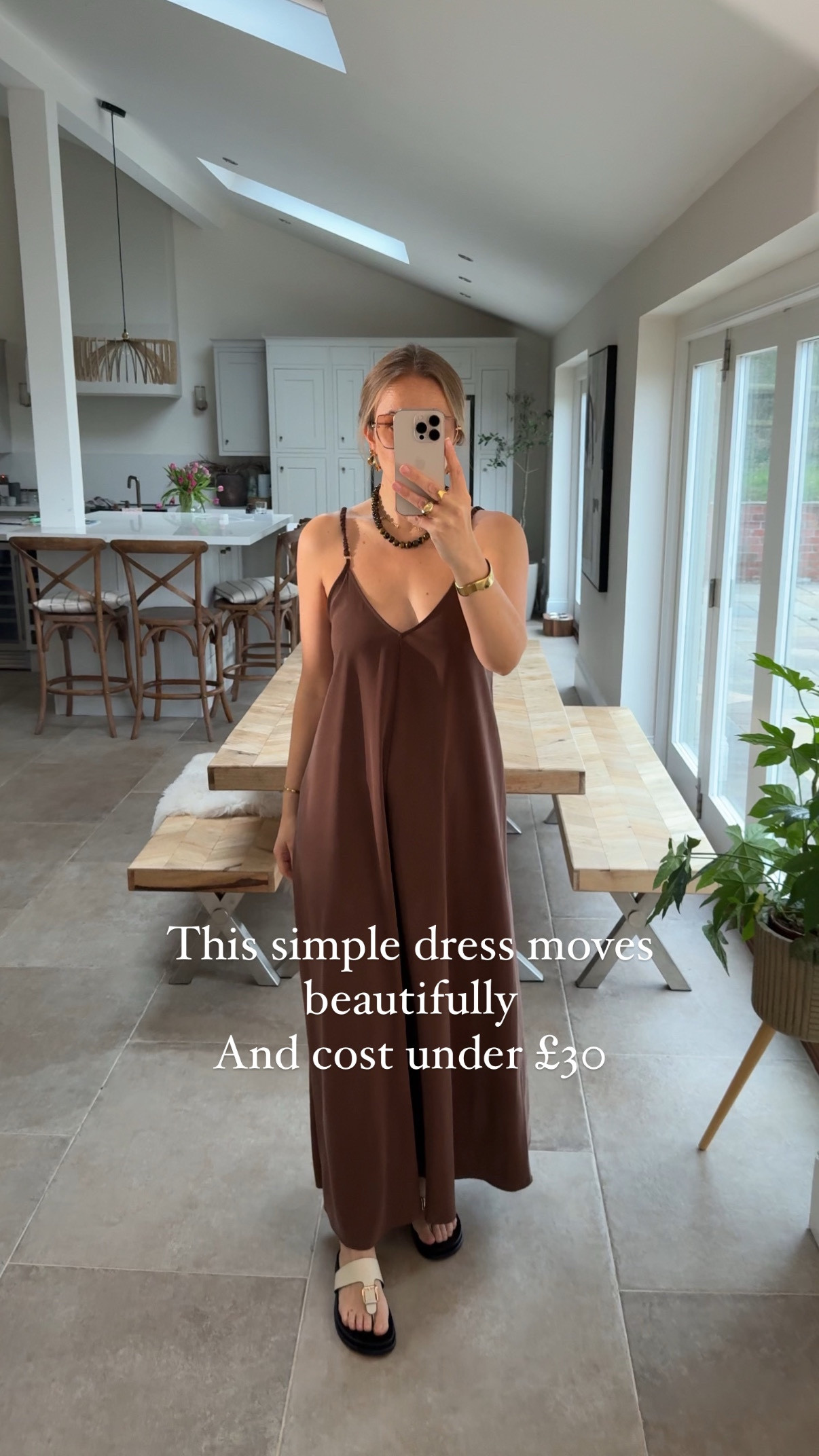 Two very simple yet stunning dresses. 
Understated luxury 
Long & effortless 
The fabric is weighty , doesn’t cling and feels dreamy to wear. The movement is 👌🏻
Wearing a medium in the brown 
Small in the black (this one has strap adjusters) 

#LTKdresses #LTKtravel #LTKsummer
