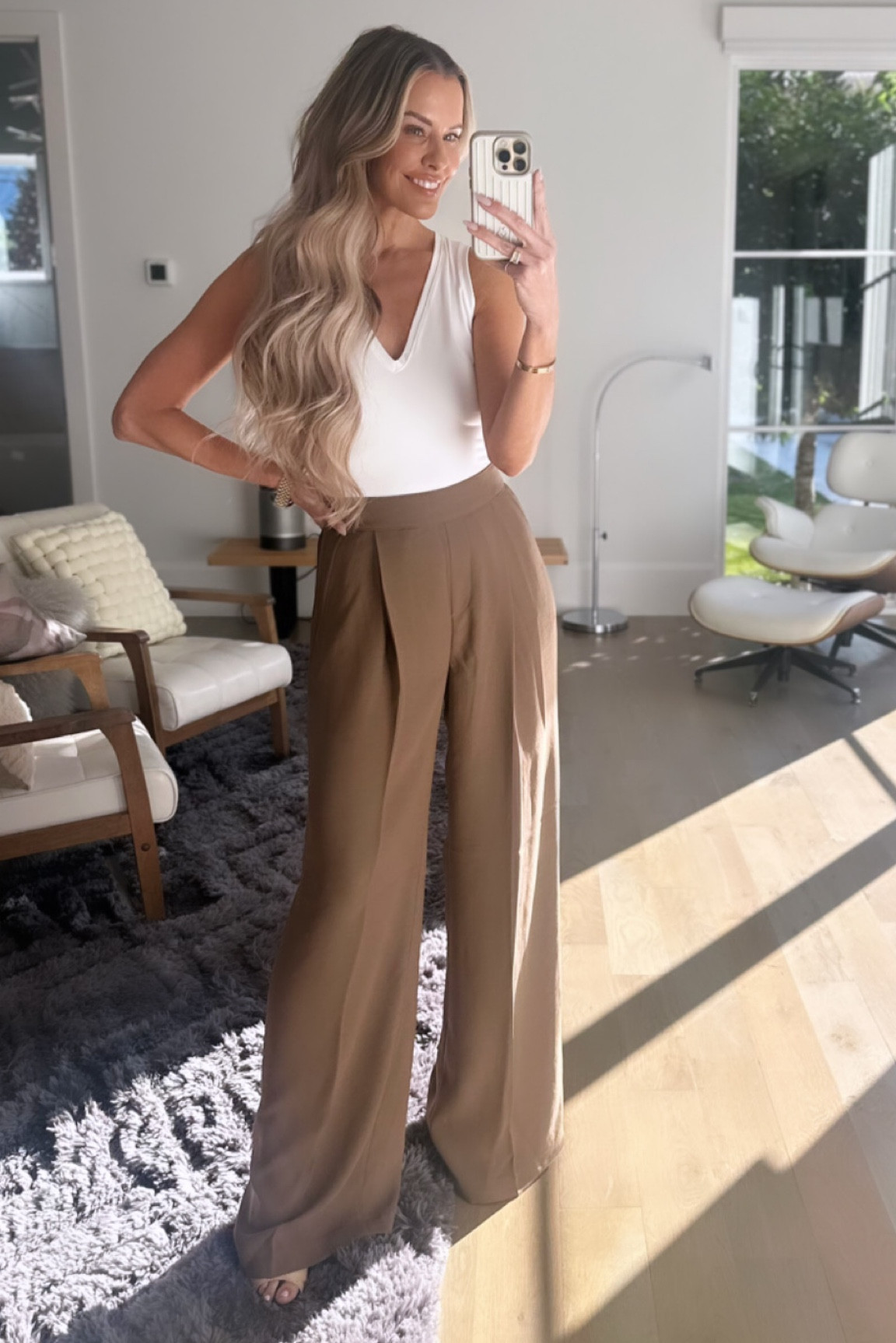 These trousers are this perfect slinky crepe fabric & a seasonless item that you would wear year round // Pulled them straight out of the box and NO WRINKLES 🙌🏻// wearing a small, tall length & a small in the tank! 

#LTKunder100 #LTKworkwear #LTKstyletip