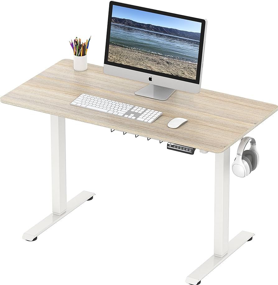 SHW Electric Height Adjustable Sit Stand Desk with Hanging Hooks and Cable Management, 48 x 24 In... | Amazon (US)