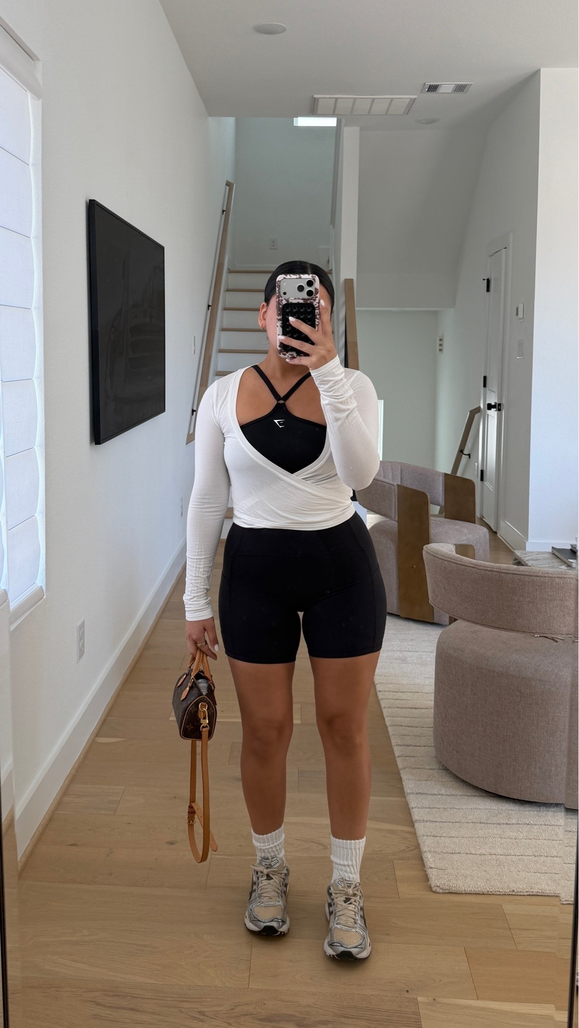 Wrap: small
Sports bra: small
Shorts: small
Sneakers: 6.5 women

#LTKootd #LTKActive #LTKfitnessgoals