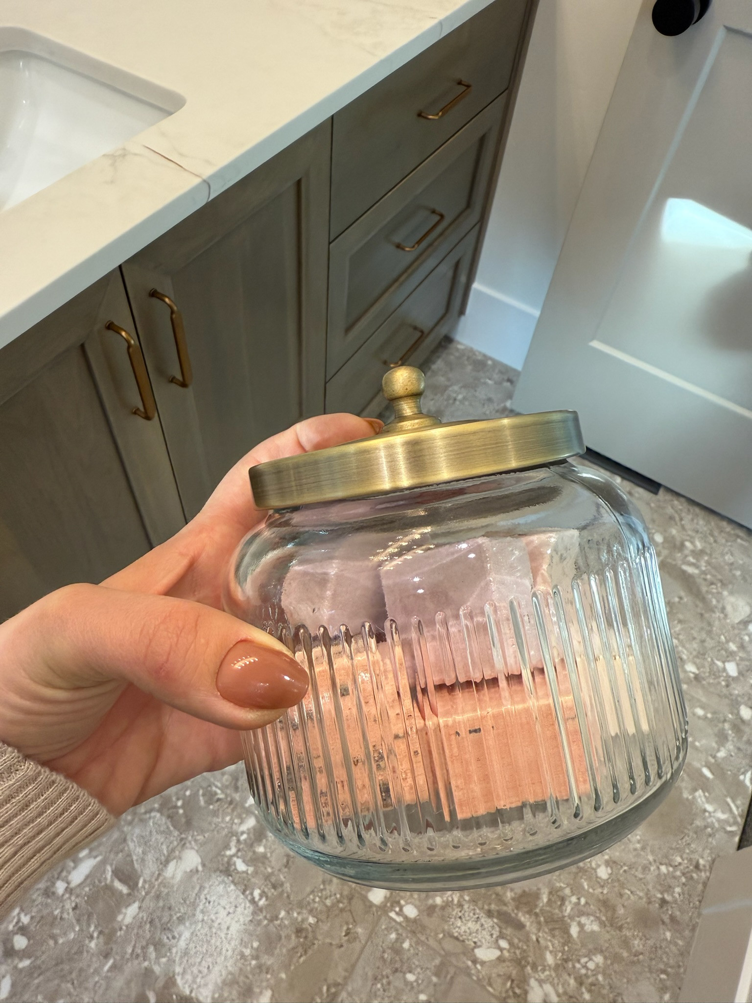 I picked up this ribbed glass canister with a brass lid for a simple bathroom upgrade that feels clean and intentional. I like it for everyday storage that still looks elevated on the counter, easy to use and easy to keep styled without clutter. Linked here if you want a functional piece that also adds a finished look. @Target

#LTKHome #LTKU #LTKSaleAlert