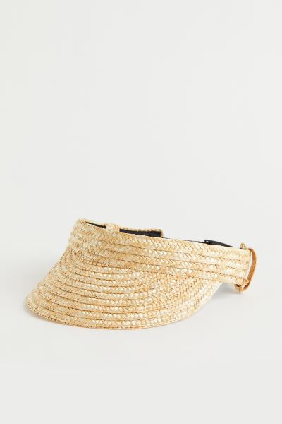 Sun visor in braided paper straw. Adjustable strap in woven fabric with a plastic fastener at bac... | H&M (US + CA)