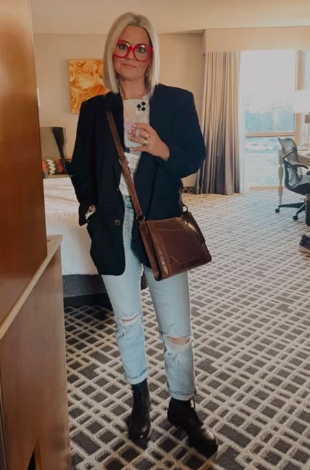 Day 2 Outfit for the Dallas Market. This blazer is so fun, and comfortable too! I had a bit of a 90’s rocker look going on. 90’s is trending my friends. A style I know a little something about. Lol. Added a pop of red. It always looks good with white and black! 


#LTKshoecrush #LTKstyletip #LTKitbag