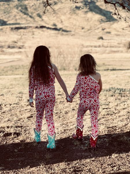The girls decided to change up their PJ looks and make them one arm 😂🏆
These PJs are the softest and such high quality and they are on 40% off right now! 
The girls are wearing them with their heart boots from another local Dallas brand, Miron Crosby. We buy these a touch big and pass them down. They are hand made in Texas ⭐️

#LTKsalealert #LTKunder100 #LTKkids