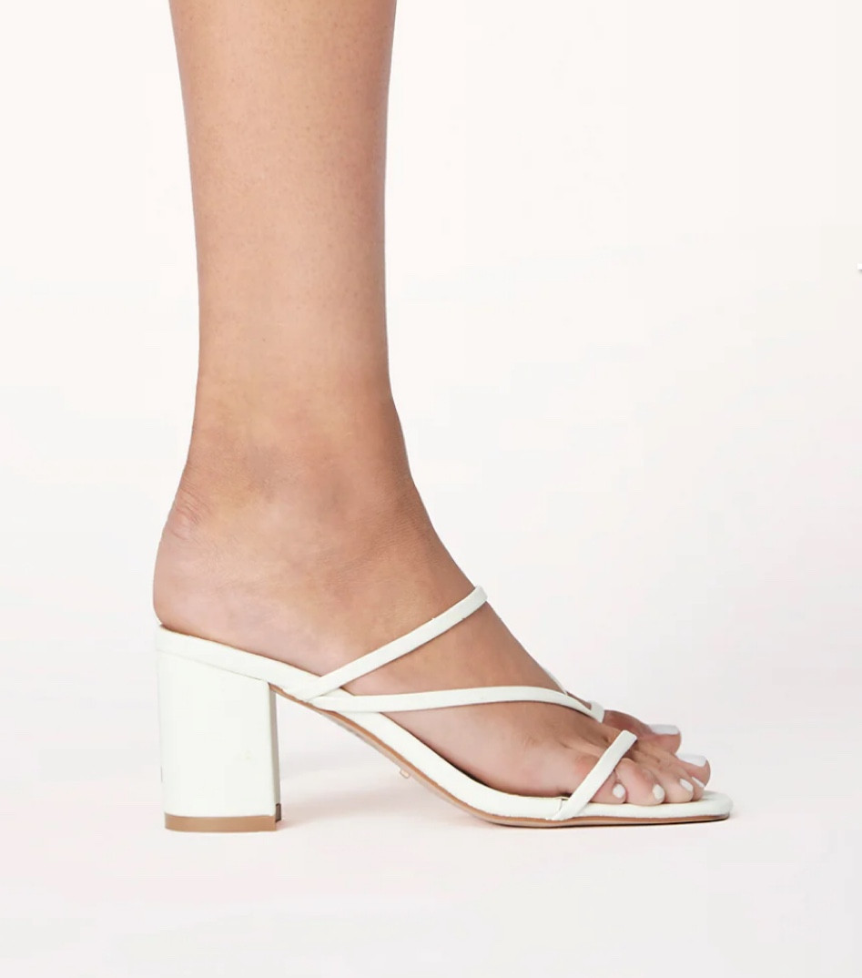 These were my go-to sandals for comfy, yet semi-dress heels to wear for dinners in Europe. Especially in towns that had cobble stone floors. Recommend getting a pair in white and in black. Literally matched every single one of my outfits! 