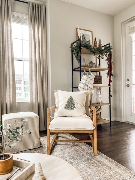 Winter decor, winter art, Bookshelf, accent chair (this color is out of stock but they have other colors available), area rug, Christmas living room decor. 

#LTKhome #LTKHoliday #LTKSeasonal