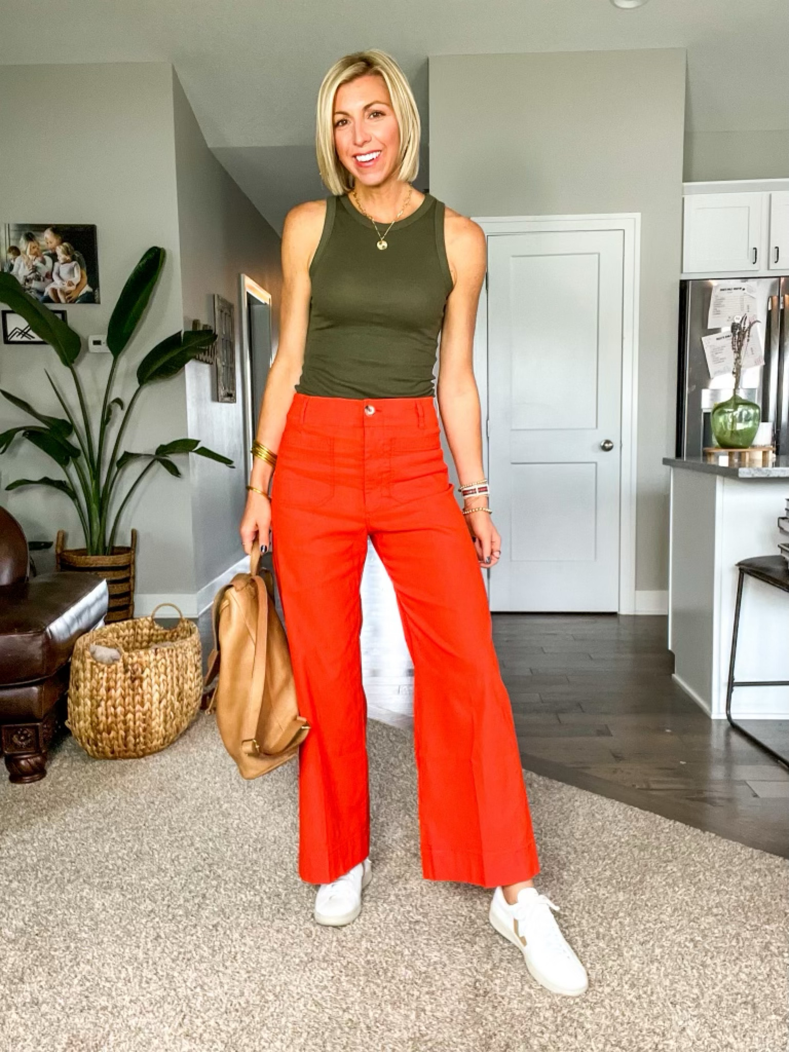 How to wear statement pants, red wide leg pants, tank top, sneakers, backpack #SarahKellyStyle #SummerOutfit #WideLegPants

#LTKxAnthro #LTKFind #LTKstyletip