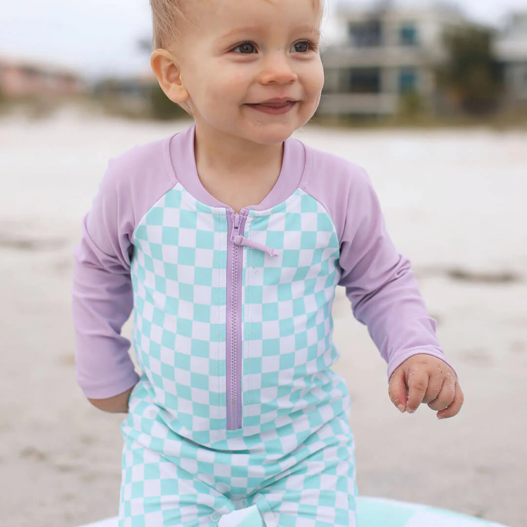 Long Sleeve Rash Guard Swim Romper Shortie | All Checked Out | Caden Lane