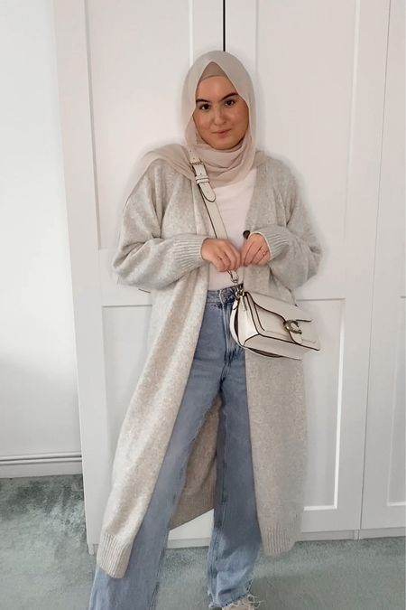 The BEST quality long sleeve turtleneck top! Check out my blog lotsoflovemariam.com for 3 ways I have styled fitted turtleneck tops modestly ! 🤍

Wide denim jeans , maxi cardigan, chunky trainers, long sleeve turtleneck top, fitted turtleneck outfit

#LTKstyletip #LTKSeasonal #LTKeurope