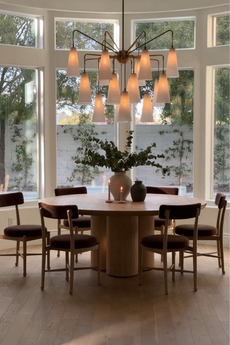 Our new dining room chairs and vases 

White vase, faux stems, chandelier, wood chairs, small vase, dining 

#LTKFamily #LTKHome #LTKStyleTip
