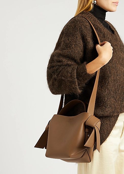 Musubi mini brown leather top handle bag | Harvey Nichols (Global)