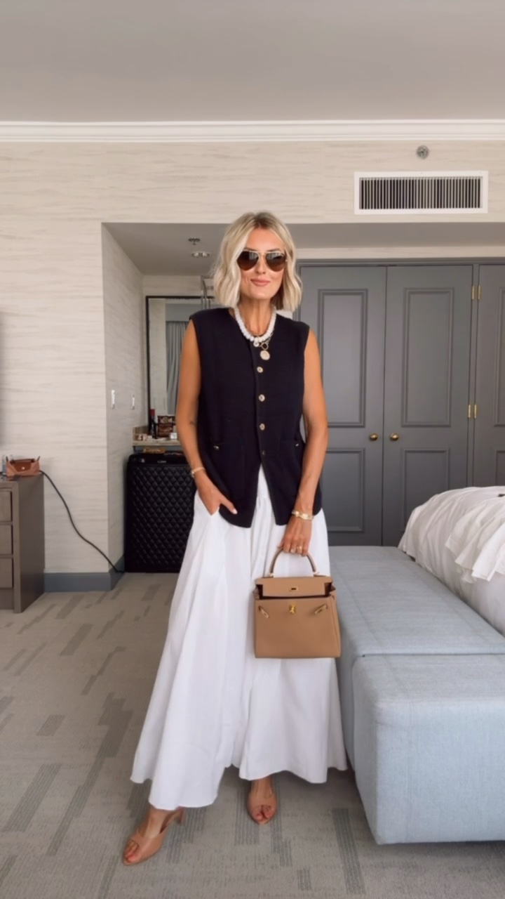 This is look so chic! This black vest and this white skirt are actually Amazon finds! This is such an elevated look that you could even wear to work! Wearing S! Loverly Grey, summer outfit, summer workwear, black vest, maxi skirt, white skirt, Amazon

#LTKootd #LTKSeasonal #LTKWorkwear