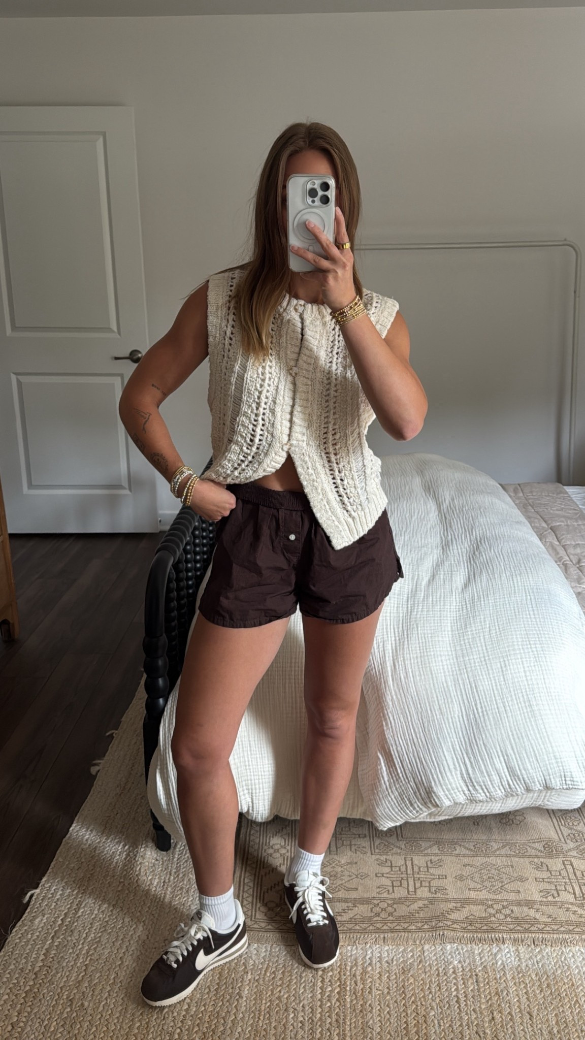 8/19/25 One of my favorite ways I’ve been styling my Nike Cortez sneakers 🤎 Wearing my Aritzia TNA brown boxer shorts with a cozy sweater vest I picked up from Topshop at Nordstrom a while back — such an easy, neutral look for summer into fall. Linking everything I can here ✨

#LTKStyleTip #LTKShoeCrush