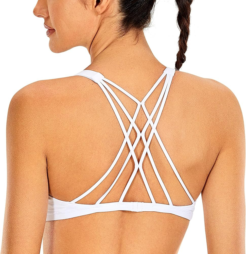 CRZ YOGA Women's Cute Yoga Sports Bra Strappy Sexy Criss Cross Back Padded Low Impact Workout Bra To | Amazon (US)