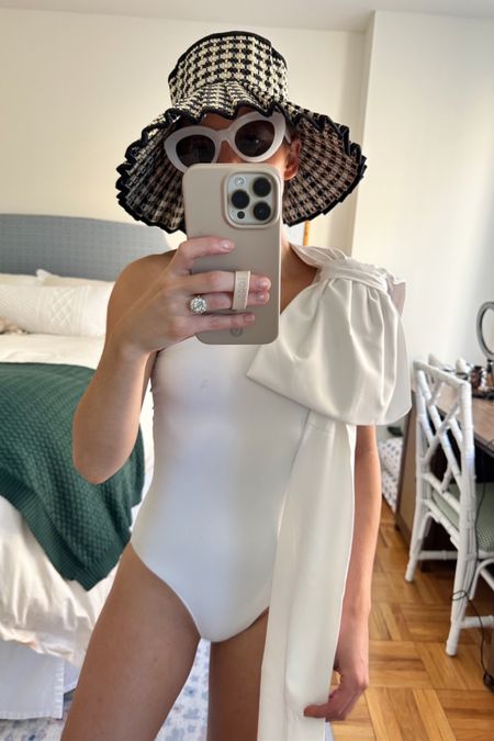 Over the Moon one shoulder bow swimsuit, oversized white Amazon sunglasses, and chic beach hat 

#LTKswim #LTKtravel #LTKwedding