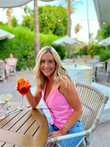Vacation mode: ON! 
Dinner and a concert 🥂
Outfit: pink vest, straight leg jeans, and gold kitten heels

#LTKOver40 #LTKSeasonal #LTKFestival