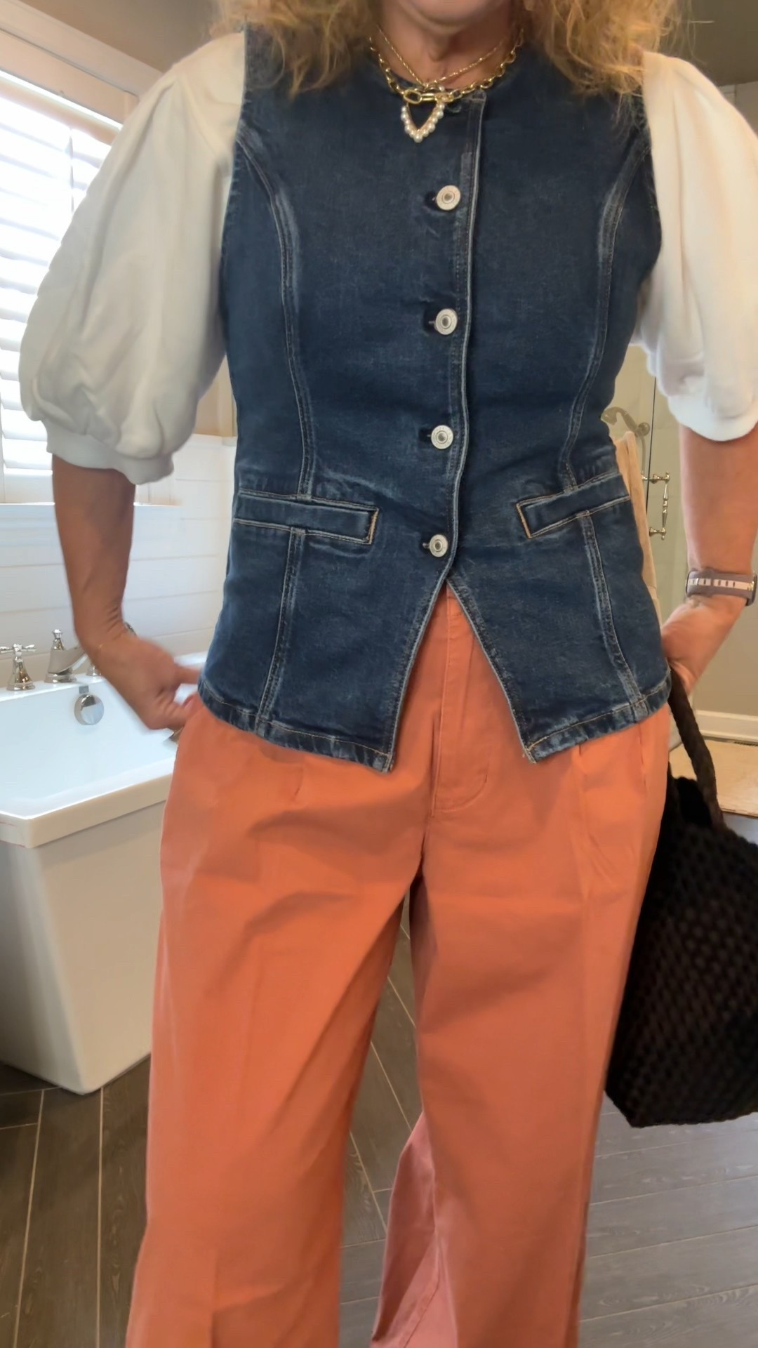 Love this outfit!!! The pants are baggy and quite roomy but love that!!! Wearing a medium/8 shirt 
Vest size medium 
White top size medium 
Naghedi bags are a braided neoprene. I love mine!!! 

American eagle 

#LTKOver40 #LTKWatchNow #LTKItBag