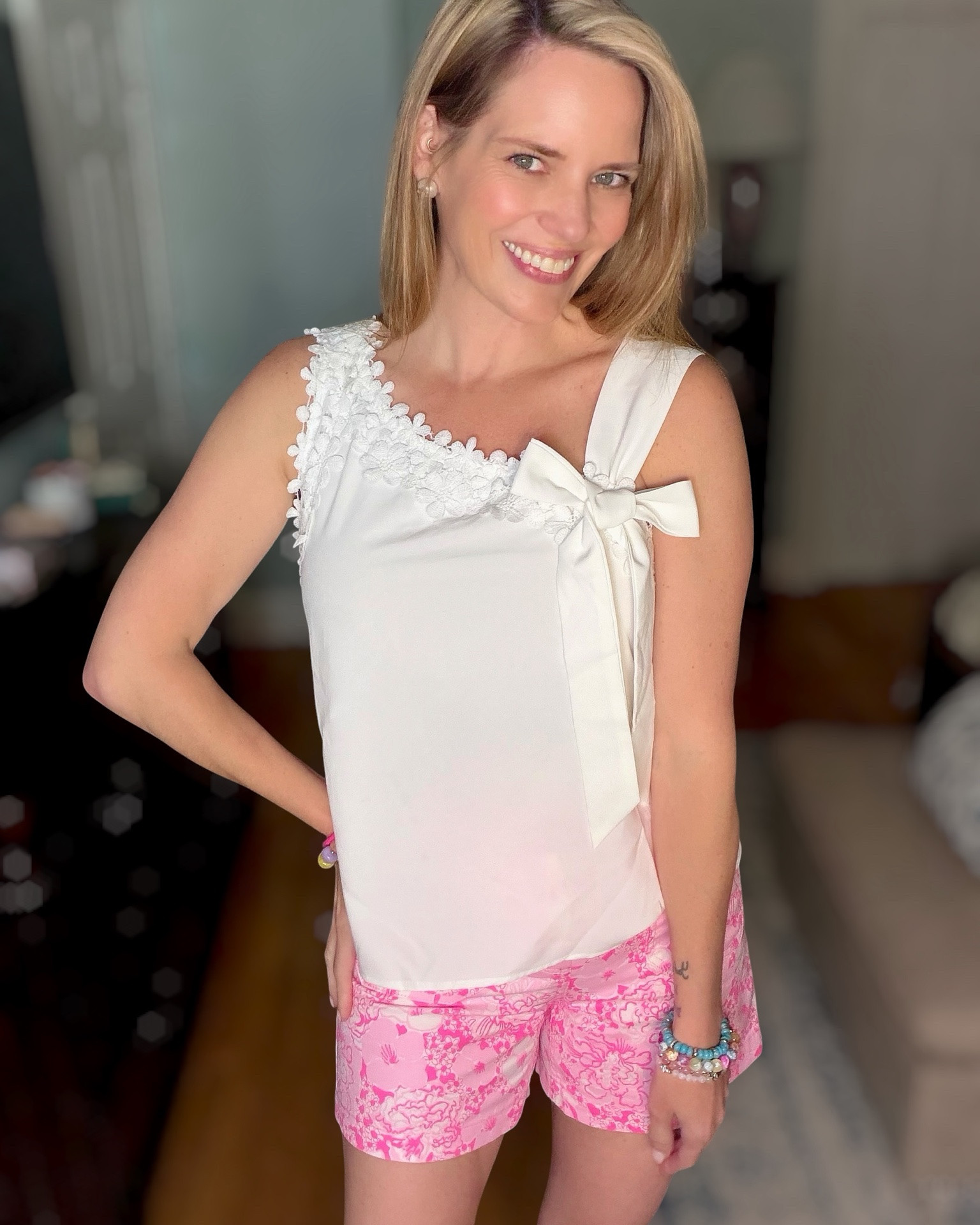 🎀 Pretty in Pink Summer Shorts Outfit 🎀

A feminine summer look featuring a sweet bow-detail top paired with vibrant pink floral shorts! The delicate lace trim and statement bow add a polished touch, while the cheerful print keeps things fun and playful. Finished with woven wedge sandals and colorful beaded bracelets for the perfect sunny-day outfit. 💕🌸☀️

Whether you’re headed to brunch, shopping with friends, vacationing, or enjoying a casual summer day, this outfit is effortlessly chic and easy to wear.

summer outfit ideas, pink floral shorts outfit, preppy summer style, bow detail top, feminine fashion, colorful summer accessories, vacation outfit inspiration, resort casual style, Lilly Pulitzer inspired look, woven wedge sandals, classic summer fashion, colorful bracelet stack, chic casual outfit, women’s summer trends, bright summer style 🌷✨

#LTKOver40 #LTKPetite #LTKootd