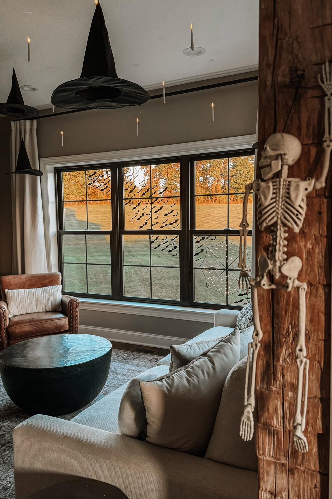 Halloween decor, skeleton, witch hats, flickering candles, hanging candles, fall 2024

#LTKSeasonal #LTKhome