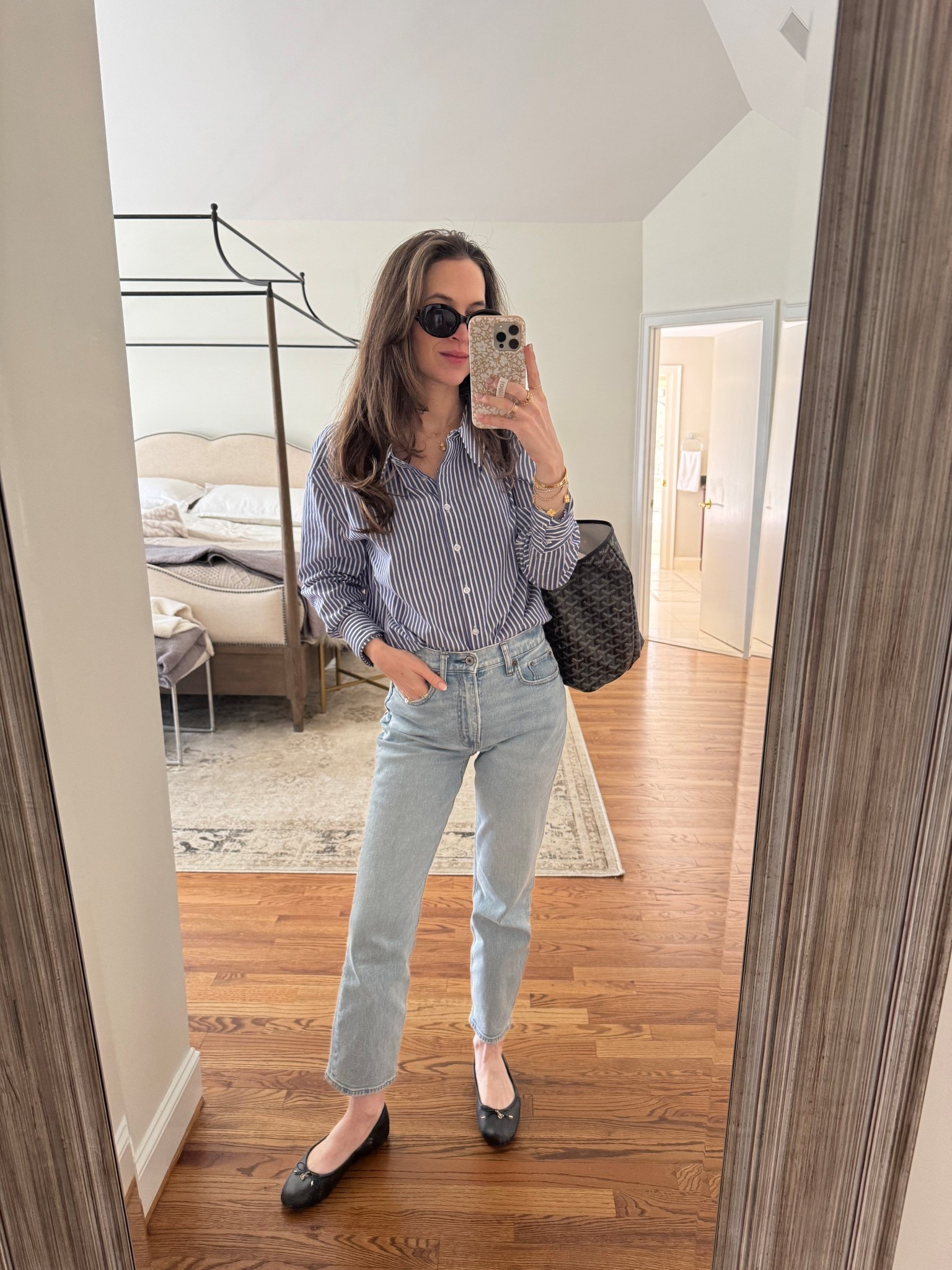 Easy spring transition outfit. Shirt runs slightly oversized, wearing S here, could have done XS for more fitted look. Jeans run true (wearing 25R, I’m 5’5). Found 2 great look for less options for my Goyard tote  

#LTKFindsUnder100 #LTKStyleTip #LTKSeasonal