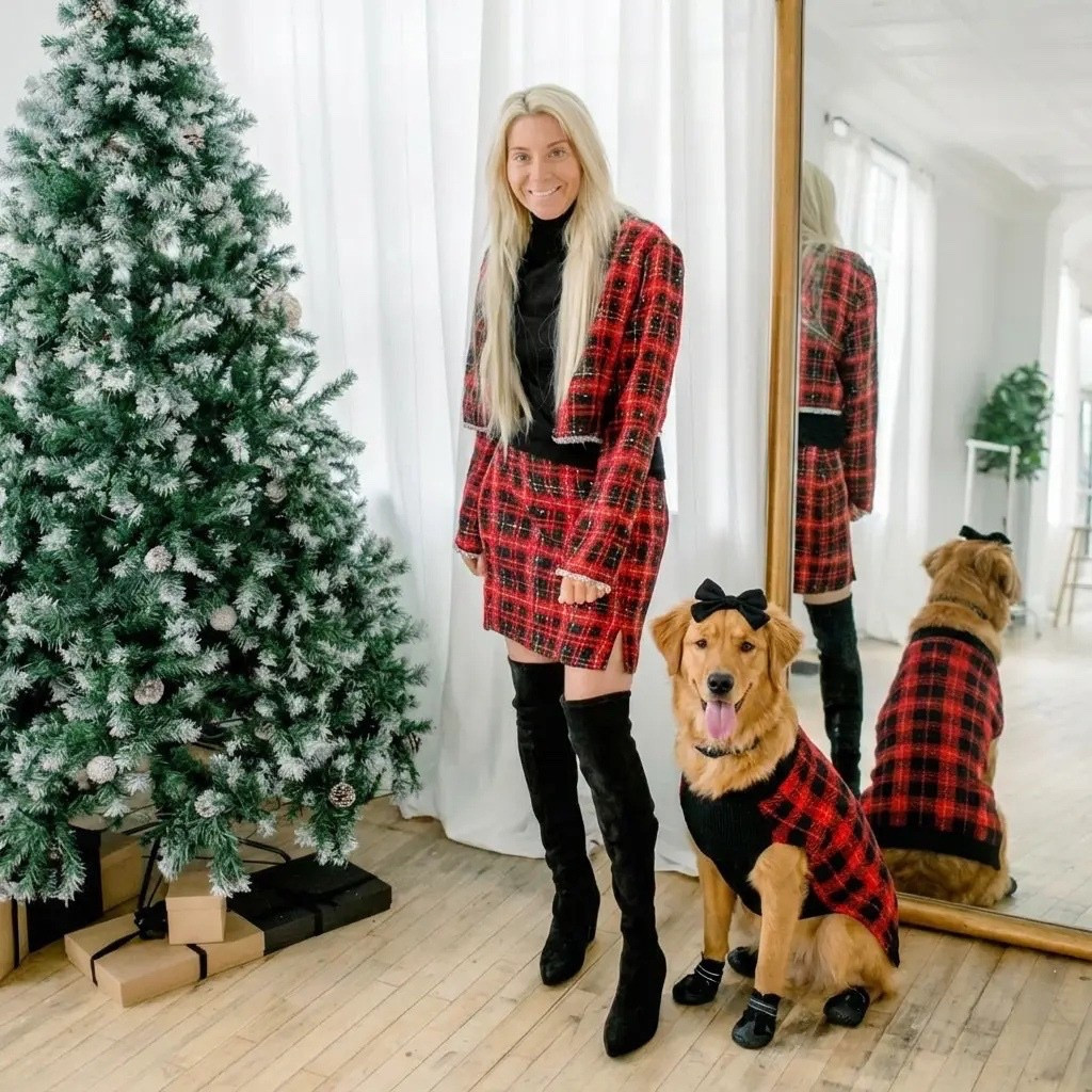 
A bright, modern holiday studio with soft natural light pouring through sheer white curtains. A tall flocked Christmas tree stands to the left, surrounded by neatly wrapped neutral-toned gifts tied with black ribbon. In the center, a stylish woman with long blonde hair wears a fitted black turtleneck with gold button accents and festive red-and-black plaid pants. Her red bow heels add a playful, elegant pop of color. Sitting proudly beside her is a golden retriever dressed to match—wearing a cozy red plaid scarf and tiny red sneakers, creating an adorable coordinated holiday moment. Behind them, a full-length gold mirror reflects the scene, adding depth and warmth to the festive aesthetic. The overall vibe is cheerful, polished, and Pinterest-perfect holiday magic.

⸻

Hashtags

#holidayphotoshoot #christmasstyle #festivefashion #matchingoutfits #dogmomlife #goldenretrieverlove #holidayaesthetic #plaidseason #christmasvibes #winterstyle #pinterestinspired #styledshoot #holidaymagic #trendychristmas #ootdinspo #fashionandpets #holidayhome #joyfulmoments #redandplaid #christmascontent #cutedogpics #holidaycheer #festiveseason #studiochristmas #trendyheidi

#LTKdayinmylife #LTKHoliday #LTKGiftGuide