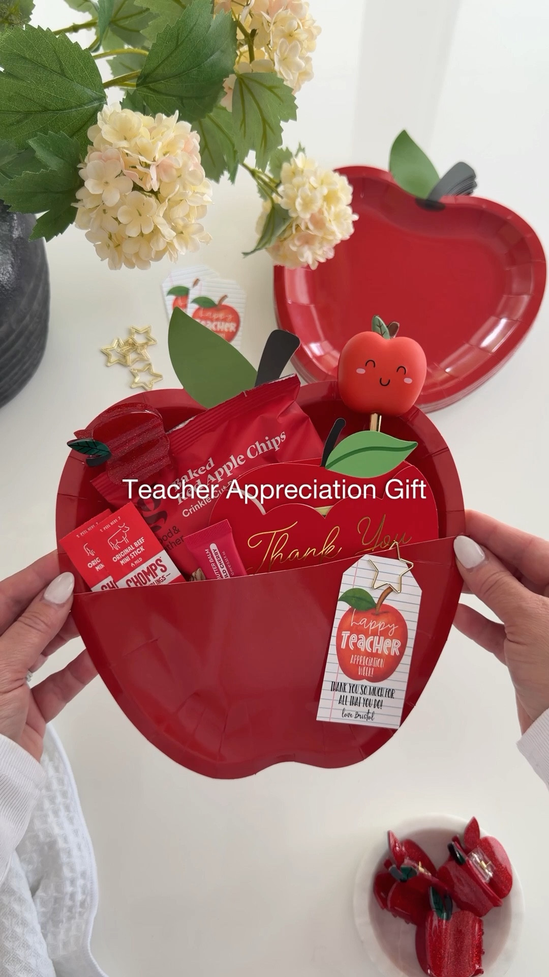 The cutest little DIY teacher appreciation gift 🍎 

I created an Apple gift pouch with two paper plates and hot glue.  Fill with any Apple or red themed goodies for a coordinated moment. Of course you gotta include a gift card because that’s what teachers really want! 

#LTKSeasonal #LTKKids #LTKmomlife