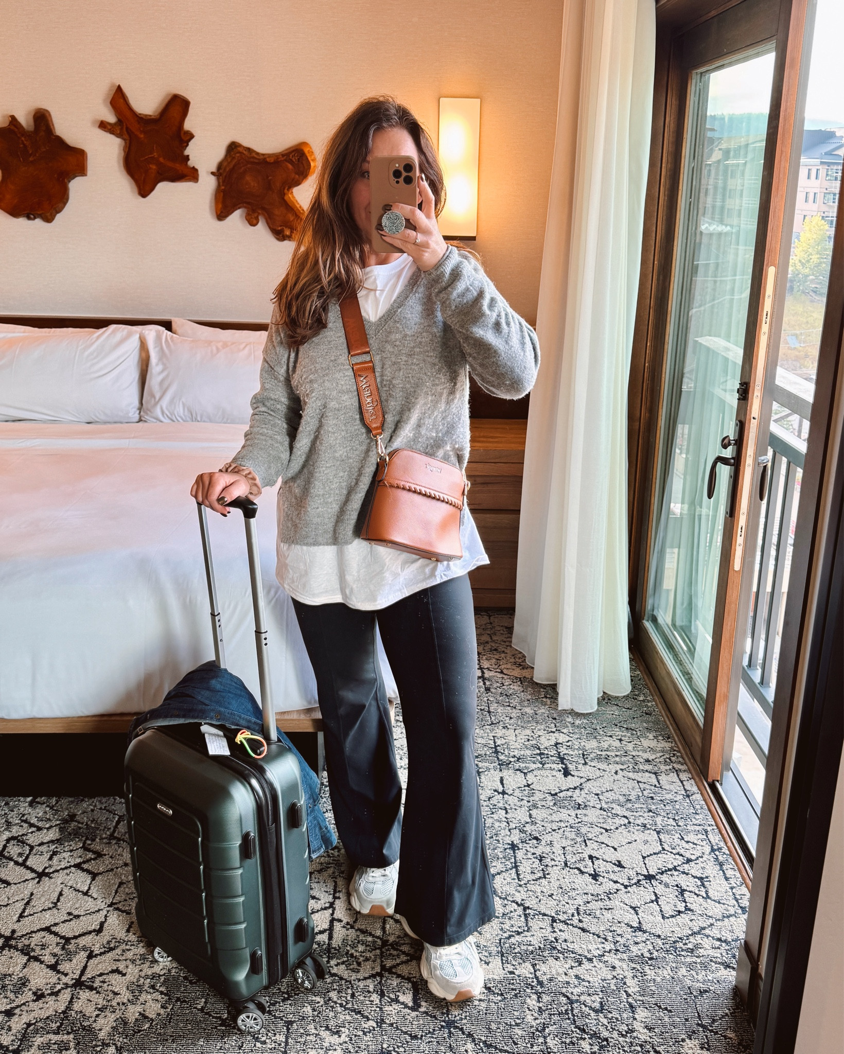Travel Day Outfit 
Wearing size large in pants
X Large in white tee
Large in sweater 
Lipstick: Pillow Talk

Fall Outfit, travel style, luggage, wrangler, aritzia, western accessories, casual style 

#LTKMidsize #LTKTravel #LTKOver40