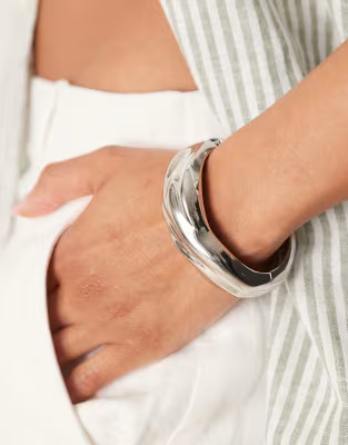 ASOS DESIGN bangle with molten design in silver tone | ASOS | ASOS (Global)