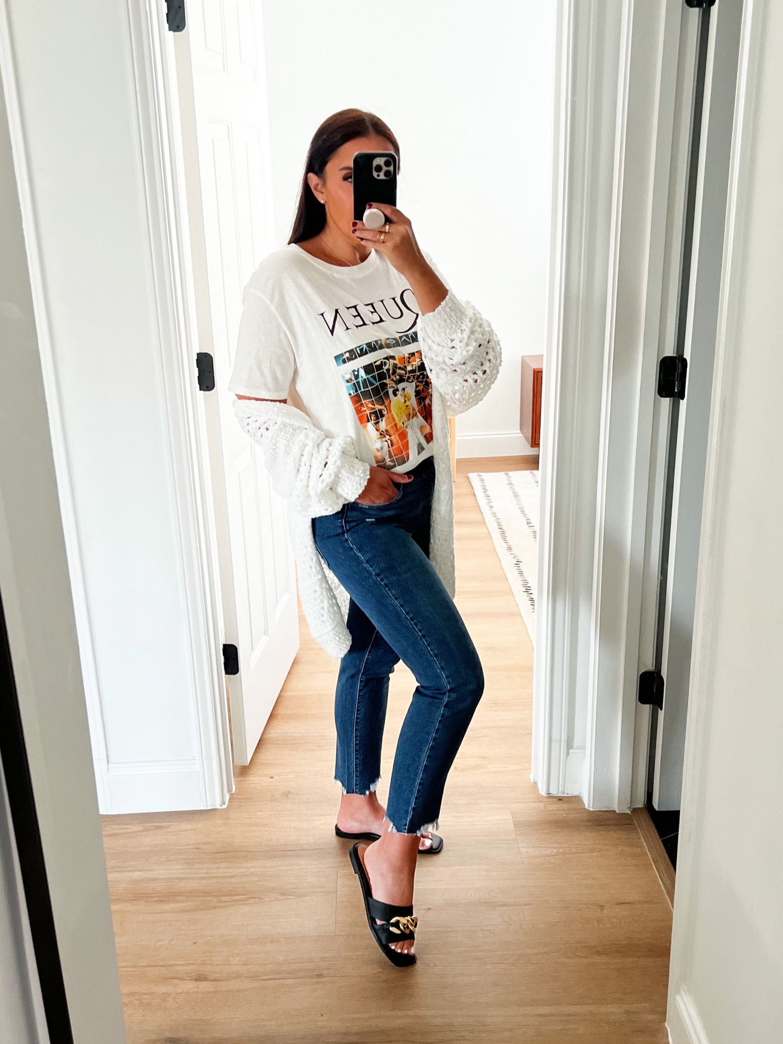 Time and Tru Women's Band Graphic T-Shirt wearing size medium. Time and Tru Women's Boyfriend Jeans with Sharkbite Hem wearing size 6. Oversized Knit Cardigan Sweater wearing size medium. Time and Tru Women's Two Band Chain Sandals wearing size 8.5. 
