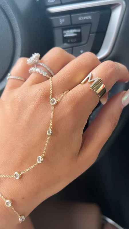 My hand chain and my initial ring were the most asked about in DMs this week! 

Code RACHMOON15 for the hand chain! 

#LTKstyletip