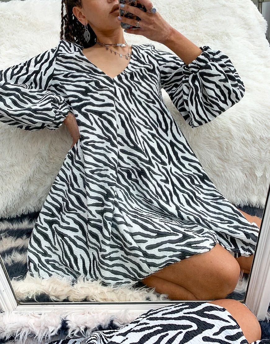 ASOS DESIGN textured mini V neck swing dress in zebra print-White | ASOS (Global)