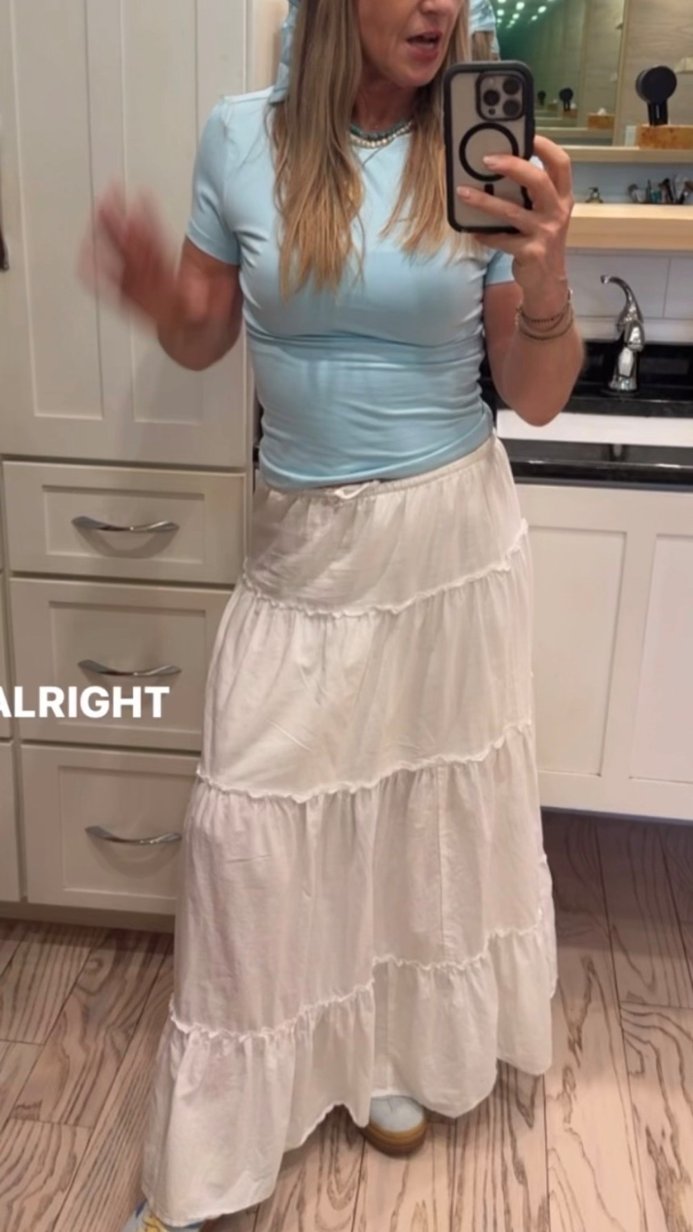 Summery, white tiered skirt and tee. Each go with anything! So versatile.

#LTKootd #LTKOver40