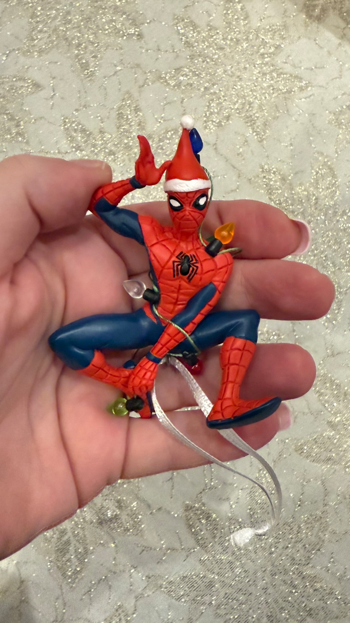 This Hallmark Spider-Man Christmas ornament is a must-have for Marvel lovers and kids who want their favorite superhero on the tree. The Spider-Man hanging-from-lights design is so cute for boys’ Christmas tree decor and makes a great Marvel gift idea or stocking stuffer. It’s durable, collectible, and part of Hallmark’s bestselling ornaments for superhero fans.

#LTKGiftGuide #LTKKids #LTKHoliday