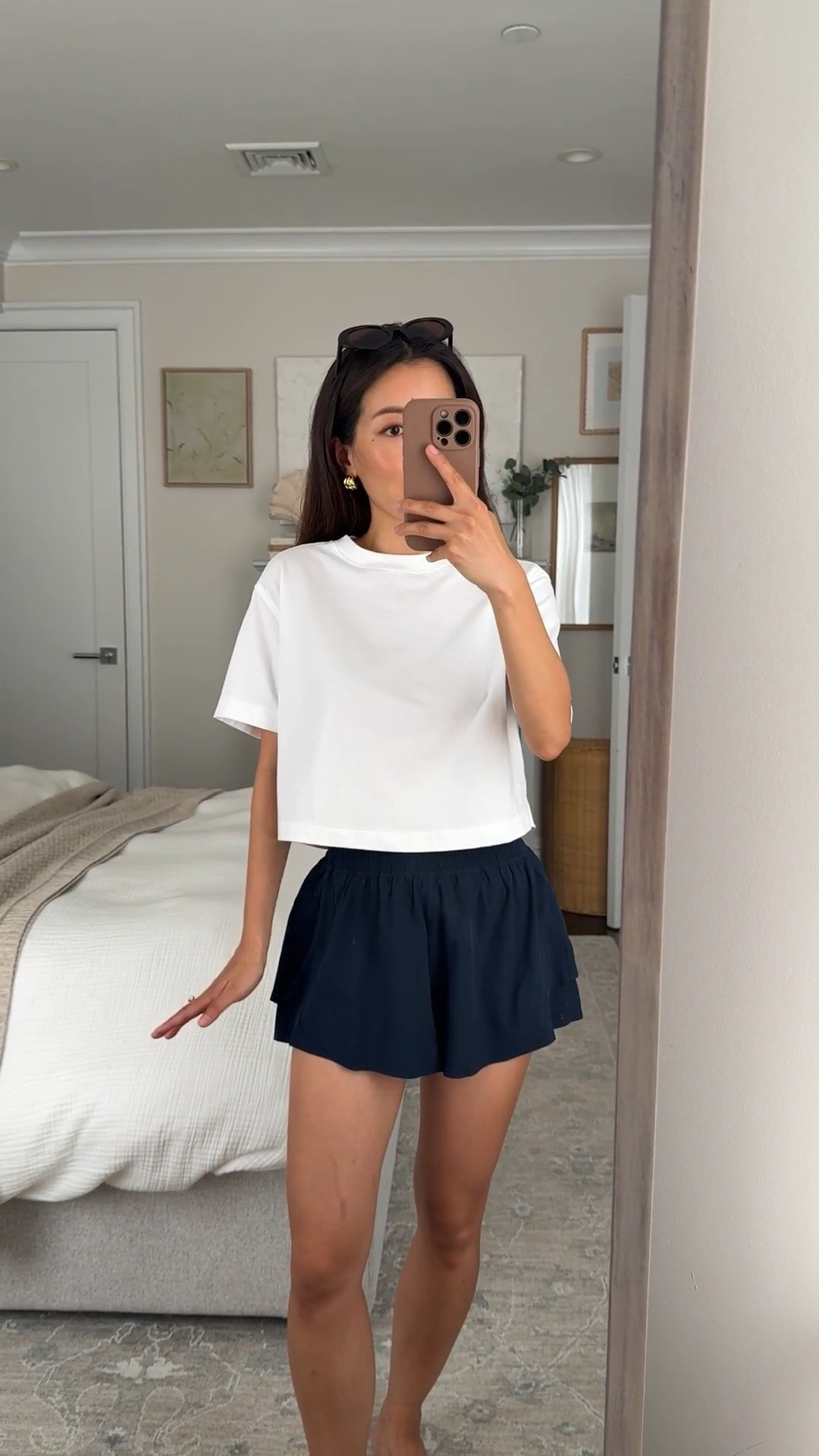 Sizing info below! 
• All Yours Organic Cotton Cropped T-Shirt xxs. Soft but has some boxy structure and the length is great for still showing the waistline but doesn’t show my skin. 
• High-rise flutter shorts size XS. I sized up. XS waist measures 24” when not stretched. 
• Madewell sunglasses 

Athleisure, walks, easy mom style, running errands

#LTKPetite #LTKActive #LTKmomlife
