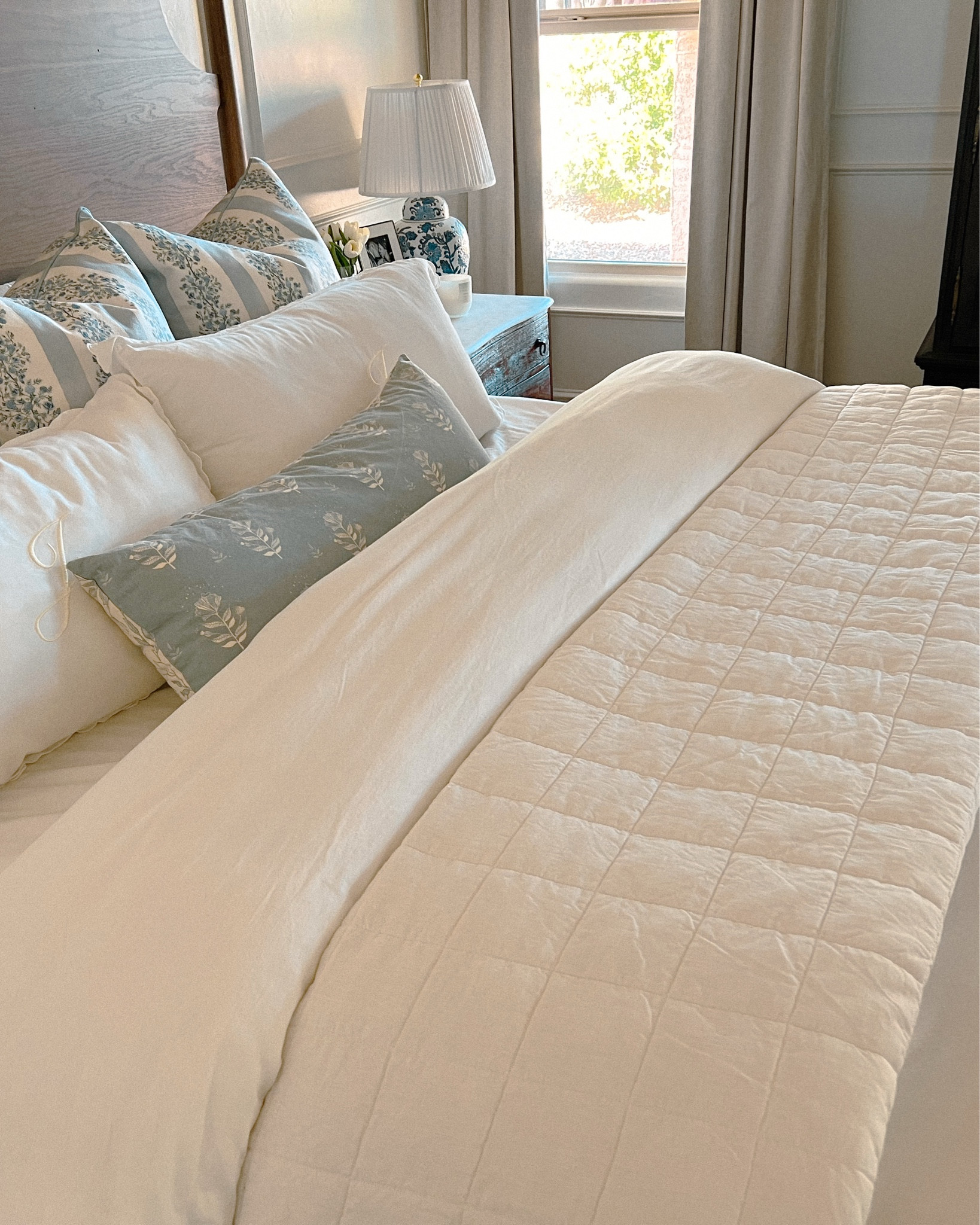 Bedding refresh 💐 
•
•
The not-so-secret to a luxurious bed is layers. The secret to a breathable bed that doesn’t overheat is the quality of materials you choose. I prefer 100% cotton sheets and duvet cover, good down insert, and this linen quilt to top it off. By keeping your fabrics breathable, you can ensure a better nights sleep. Many cheap quilts and comforters are made of ployester and it traps in your body heat. Choose wisely ✨ 

#LTKHome #LTKmorningroutine #LTKselfcare