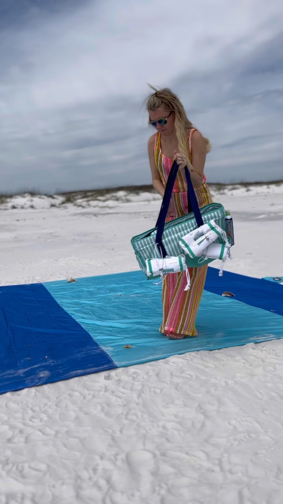 My favorite beach bag! 

It comes with a couple towels and a cooler too. Plus, there’s plenty of space for everything we need.

#LTKSeasonal