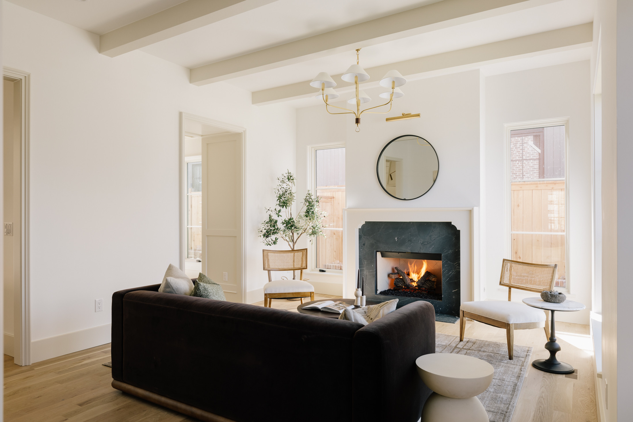 Velvet brown sofa paired with cane upholstered accent chairs and a neutral rug to create a cozy living room.

Living, rug, velvet, upholstered, chair, neutral, rug 

 #LTKHome