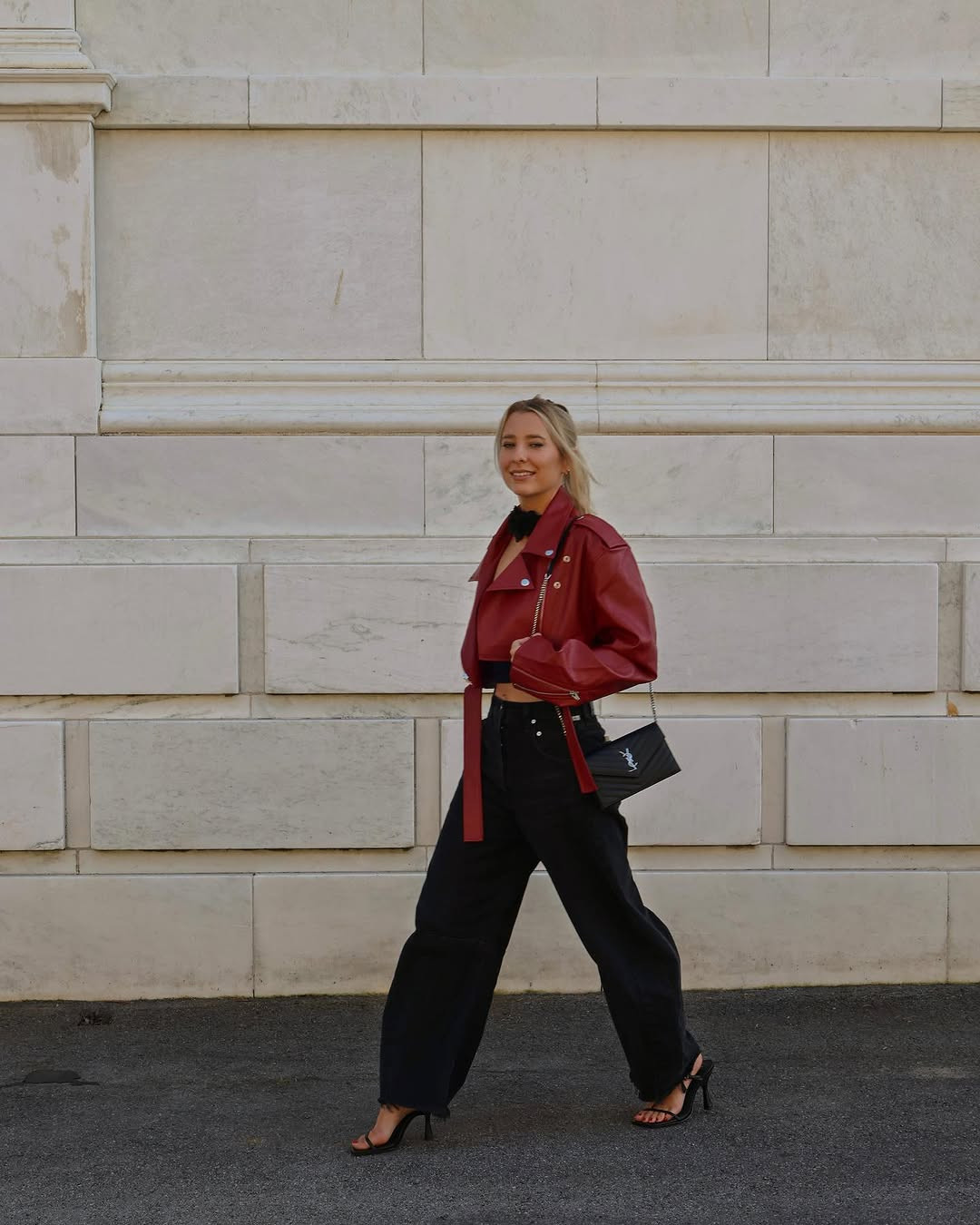 Obsessed with this cropped red moto jacket, wide-leg black denim, and strappy heels for a cool night out. #LTKDateNight #RedMotoJacket #StreetStyle 

 #LTKHoliday #LTKdayinmylife #LTKootd