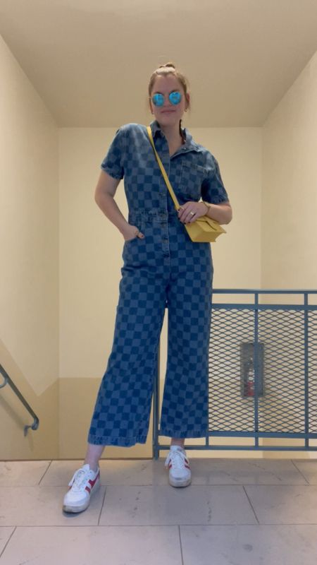 Checkered denim jumpsuit, gola sneakers, Jacquemus yellow crossbody bag, harry styles concert outfit, gold jewelry from amazon, rings, hoop earrings, blue flash rayban sunglasses 

#LTKstyletip #LTKunder100 #LTKunder50