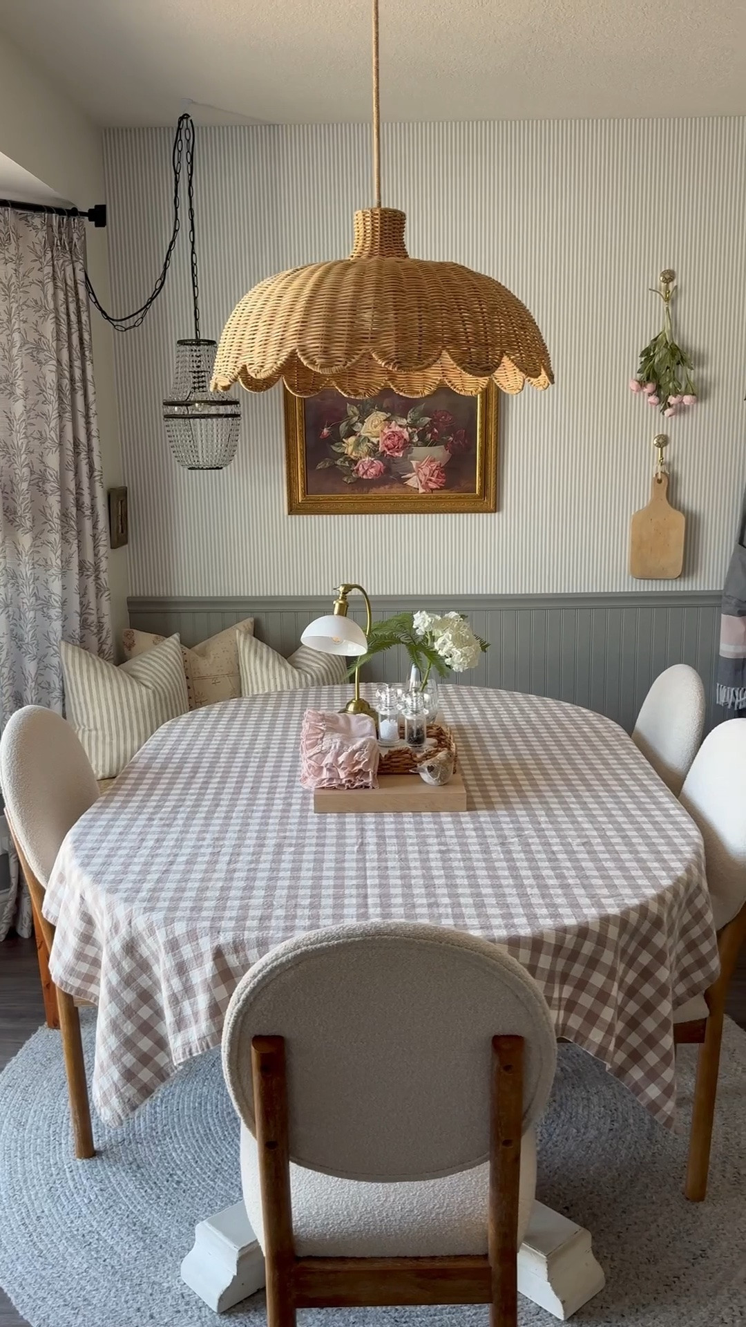 No built-ins just imagination.
Boucle dining chairs 
Woven Ratan chandelier 
Dining bench 
Boucle counter stools 
Pinch pleat curtains