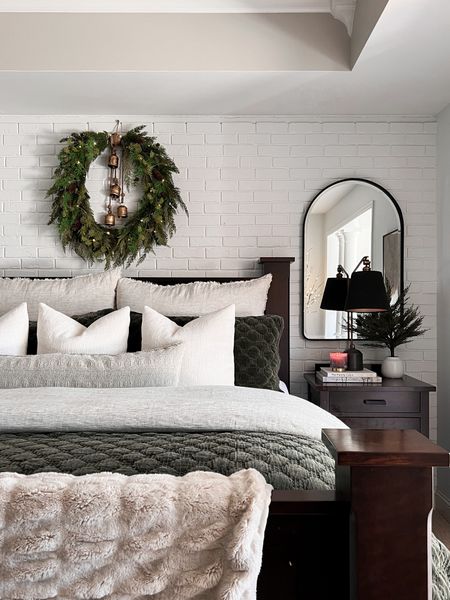 Holiday bedroom . Sometimes all you need is a wreath! 

Arched wall mirror, amazon decor, cypress tree, amazon home, green quilt, pottery barn, velvet quilt, holiday bedding 

#LTKSeasonal #LTKHoliday #LTKhome