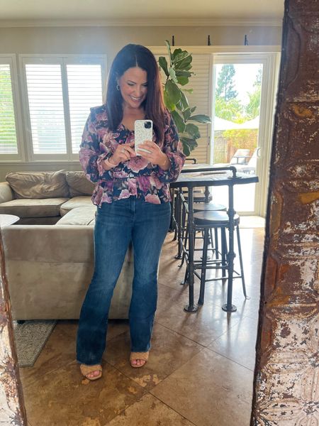 Florals for spring, why not!?! 🌸🩷 my top has sold out. I’ve linked the remaining options. I’m wearing a small for reference. My 70s flare jeans are petite and fantastic. Wearing a small (0,2,4), I’m 5’2” for reference. 

#LTKstyletip #LTKover40 #LTKfindsunder100