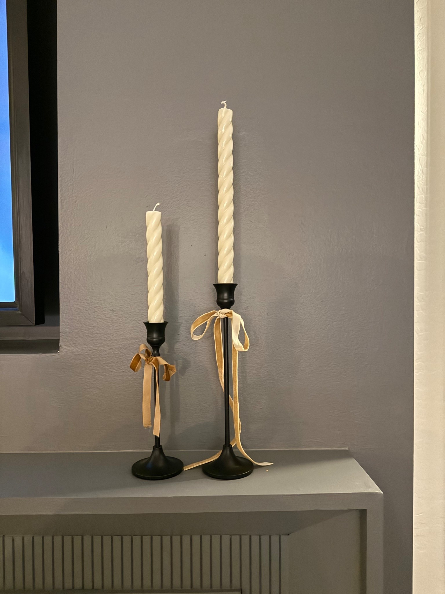 Classic black candlesticks + twisted tapers = the coziest combo. These are perfect on my fireplace mantle 🫶🏻