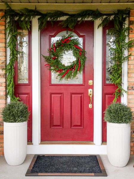 Front porch decor is up! I kept it simple this year for a classic Christmas front porch that will become winter decor without having to take anything down. The faux cedar topiary balls are my favorite find! 

#LTKhome #LTKfindsunder100 #LTKSeasonal