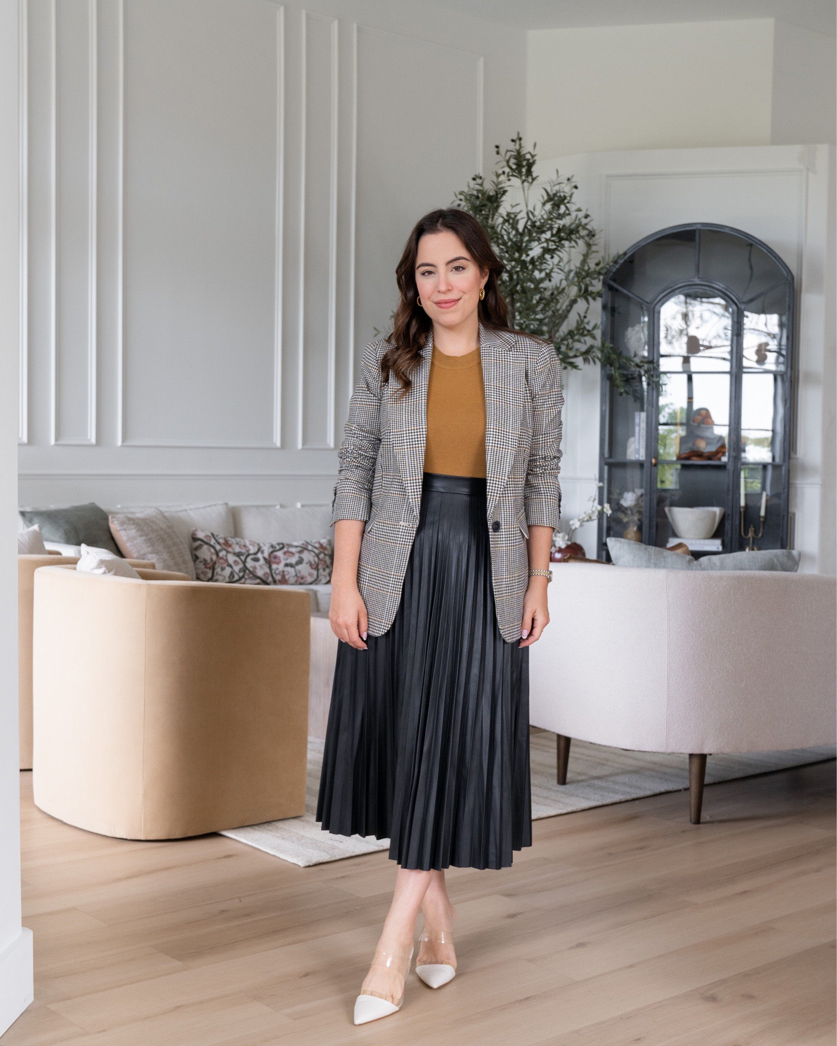 A classy and affordable outfit for Fall! Love this faux leather pleated skirt, plaid blazer and knit top, all under $60 each



#LTKunder50 #LTKstyletip #LTKunder100