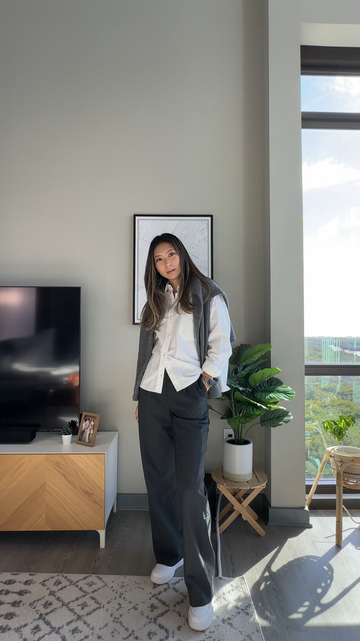 Everyday casual chic outfit // gray cashmere sweater, white button up shirt, gray tailored pants, white sneakers // French style, business casual, neutral style, workwear

#LTKworkwear #LTKfindsunder100 #LTKstyletip