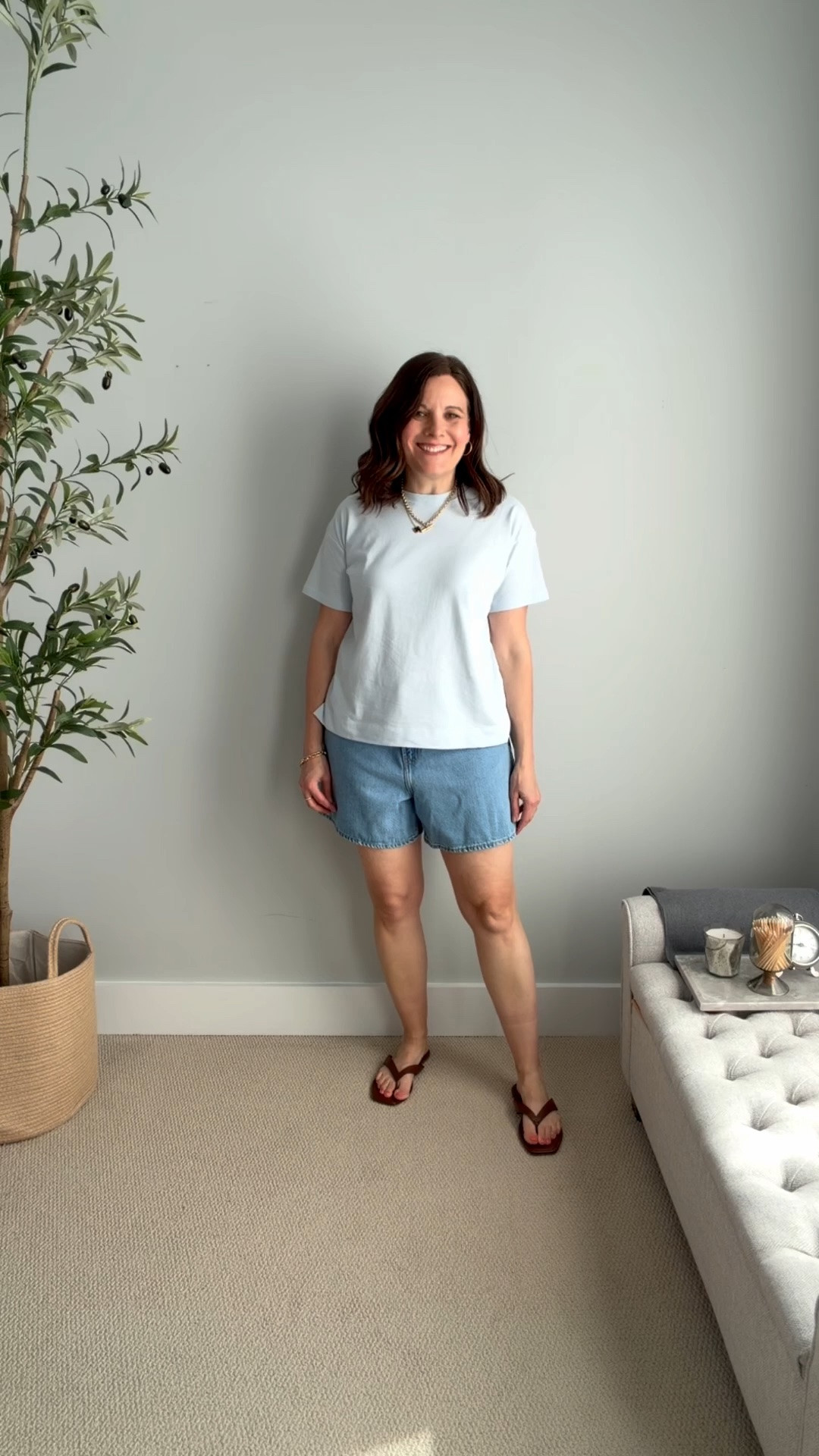These jean shorts are so good and tend to sell out early in the season, so if you find your size, it’s worth grabbing them. They’re soft, comfortable, and have that relaxed, slightly baggy fit. 
They have a 12.5” rise and a 5” inseam. I sized up one to get an even looser fit. I love how a looser leg makes my thighs look smaller. This light blue tee is from Old Navy. I’m wearing this size small because if fits big.

#LTKOver40 #LTKMidsize #LTKSaleAlert